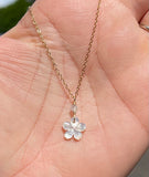 White plumeria flower with Aquamarine Gold Necklace